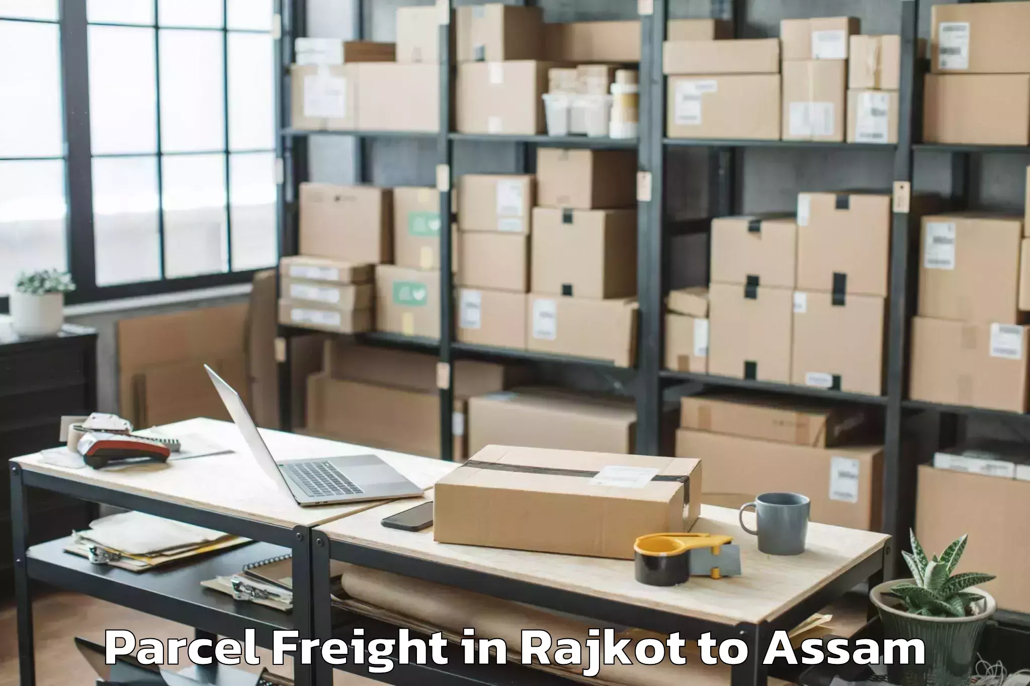 Book Rajkot to Barpeta Parcel Freight